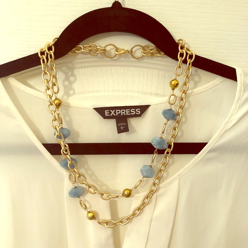 Gold link necklace with blue stones